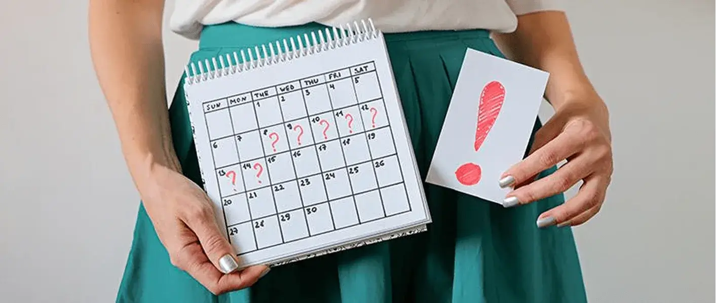 Illustration of a girl with a calendar marking her period dates
